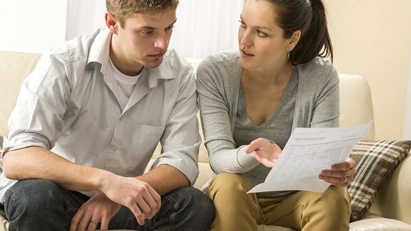 Couple looking at bank statements